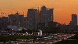 London City Airport with Canary Wharf in the distance Stock Footage