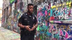 Baltimore police officer turns to rap to combat crime  News Clip