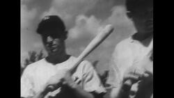 United States, c.1951: Joe DiMaggio stand next to his teammates and then uses the DiMaggio grip to hit a home run Stock Footage