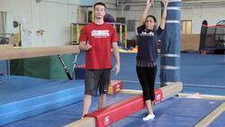 How to Do a Back Walkover on the Balance Beam Instructional Video