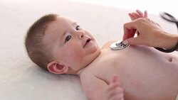Little baby boy is examined by a doctor. Stock Footage