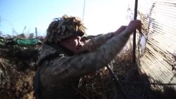 CLEAN : STOCKSHOTS: Ukrainian soldiers on eastern frontline News Clip
