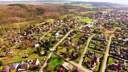 amera flight over small village Lhota suburb of Pilsen. Living in agricultural landscape. Environmentally friendly living. Czech Republic, Europe. Stock Footage