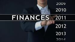 Businessman selects 2015 finances report on virtual screen, money statistics Stock Footage