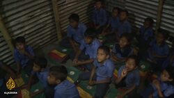 Bangladesh slum children drop out of school for full-time work News Clip