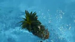 Pineapple Floating In blue Water In Swimming Pool. Healthy Raw Organic Food. Juicy Fruit. Vegetarian, Vegan Nutrition, Vitamins, Diet, summer holidays, vacation concepts. Exotic tropical background Stock Footage