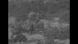 During Korean War, US soldiers firing artillery piece and mortar at Communist positions in South Korea News Clip