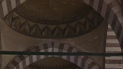 UP ANGLE OF STRIPED POINTED ARCHES AND CEILING. COULD BE SULEYMANIYE MOSQUE. ISLAMIC ARCHITECTURE. Stock Footage