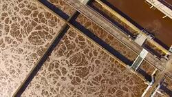 Aerial view to sewage treatment plant. Grey water recycling. Waste management theme. Stock Footage