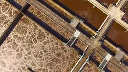 Aerial view to sewage treatment plant. Grey water recycling. Waste management theme. Stock Footage
