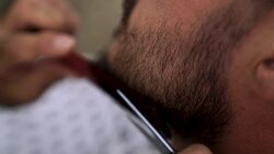 Barber Cutting Beard Stock Footage