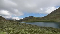 Time lapse lake scenes in mountains, national park Dombai, Caucasus, Russia, Europe Stock Footage