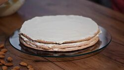 Pastry chef smeared cake with cream. Stock Footage