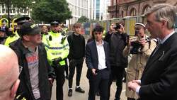 Rees-Mogg confronted by campaigner at Tory conference News Clip