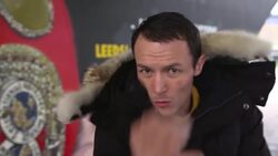 Josh Warrington shadow boxing in front of his mural News Clip