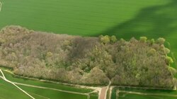 Aerials of farmland & woodland searched by police forensic teams. News Clip