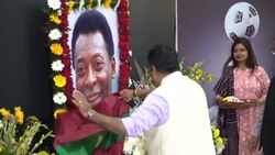 CLEAN : Fans of legendary 'king of the world' Brazilian footballer Pele mourn his death in India's Kolkata News Clip