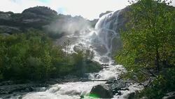 View waterfall scenes in mountains, national park Dombai, Caucasus, Russia Stock Footage
