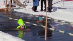 CLEAN : US: Frozen lake swim festival resumes after two year pandemic hiatus News Clip