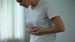 Woman with stomach pain touching tummy, suffering from gastritis, pancreatitis Stock Footage