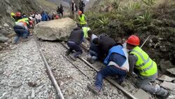 CLEAN : Peru: stranded tourists evacuated from Machu Picchu walk along railroad News Clip