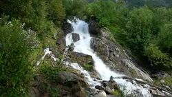 View waterfall scenes in mountains, national park Dombai, Caucasus, Russia Stock Footage