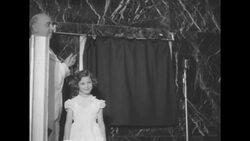 Dedication of new train station in New Orleans and pre-inaugural parade for third-term Mayor deLesseps Morrison News Clip