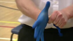 Boris Johnson makes OJ simpson joke whilst putting on gloves News Clip