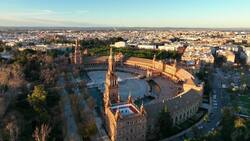 Drone Tour of Seville's Alcázar, Giralda Tower and Plaza de España Stock Footage