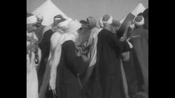 Pathe News crew on around-the-world cruise on "Empress of India" takes trip into desert near Cairo and witnesses dervishes dancing News Clip