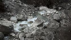 Fast mountain river flowing in stone riverbed in Himalaya Stock Footage