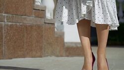 Beautiful female legs on a city street Stock Footage