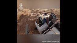 Helicopter pilots rescue truck driver stranded in in floodwaters News Clip