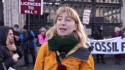 Climate protesters gather outside Parliament to call out Government fossil fuel policies. News Clip