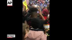 Biden adviser knocked to ground during rally Instructional Video