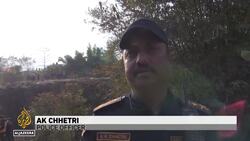 Grim task of identifying the dead begins after Nepal plane crash News Clip