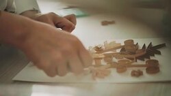 Artist hand making flower paper craft gift Stock Footage