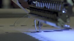 Automatic modern sewing machine embroider a pattern,Industrial embroidery equipment. Textile Manufacturers.Industrial textile factory,Textile Factory. Textile Industry. Stock Footage