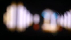 Rays of searchlights at a concert. The effect of bokeh at the festival of music. A scene at the festival of electronic music. Stock Footage