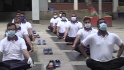 CLEAN : Bangladesh police turn to yoga to boost health during pandemic News Clip