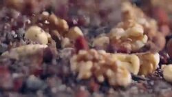 Mixed Super Foods Slow-Motion falling on wooden table, close up Stock Footage