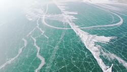 Lake in China offers stunning views of frozen azure waters News Clip