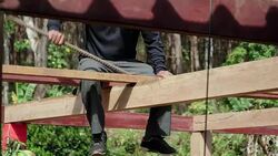Roofers are hammering nails Stock Footage