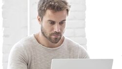 Man Busy Working On Laptop in Office Stock Footage