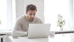 Shocked Businessman Working on Laptop, Astonished Stock Footage
