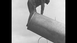 Midget clown; human cannonball shot and lands in net; 1930s News Clip