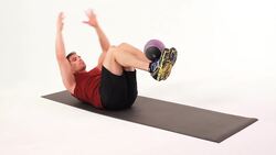 How to Do Super Crunches with a Medicine Ball Instructional Video