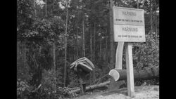 People carry their belongings as they are forced to leave the British sector of the Russian zone in Berlin News Clip