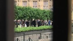 MPs queuing to vote with social distance in the UK News Clip