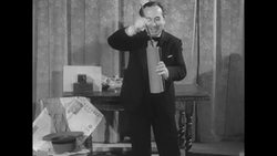 Italian magician makes hats, handkerchiefs and cigarettes disappear News Clip